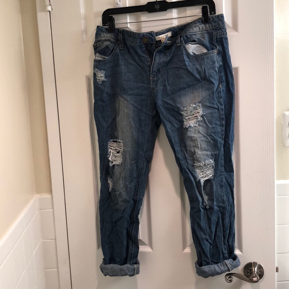 Distressed jeans.